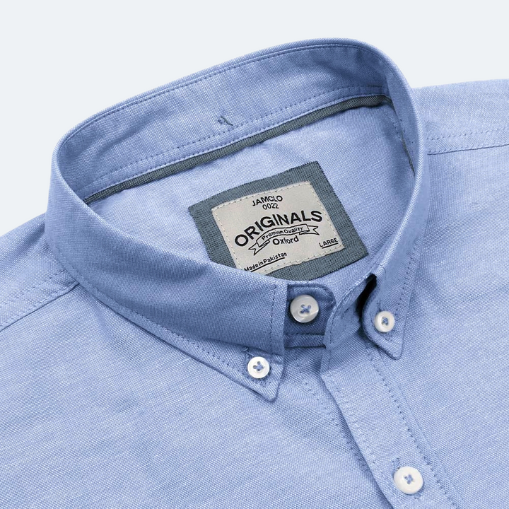 Mild Blue Oxford Shirt.